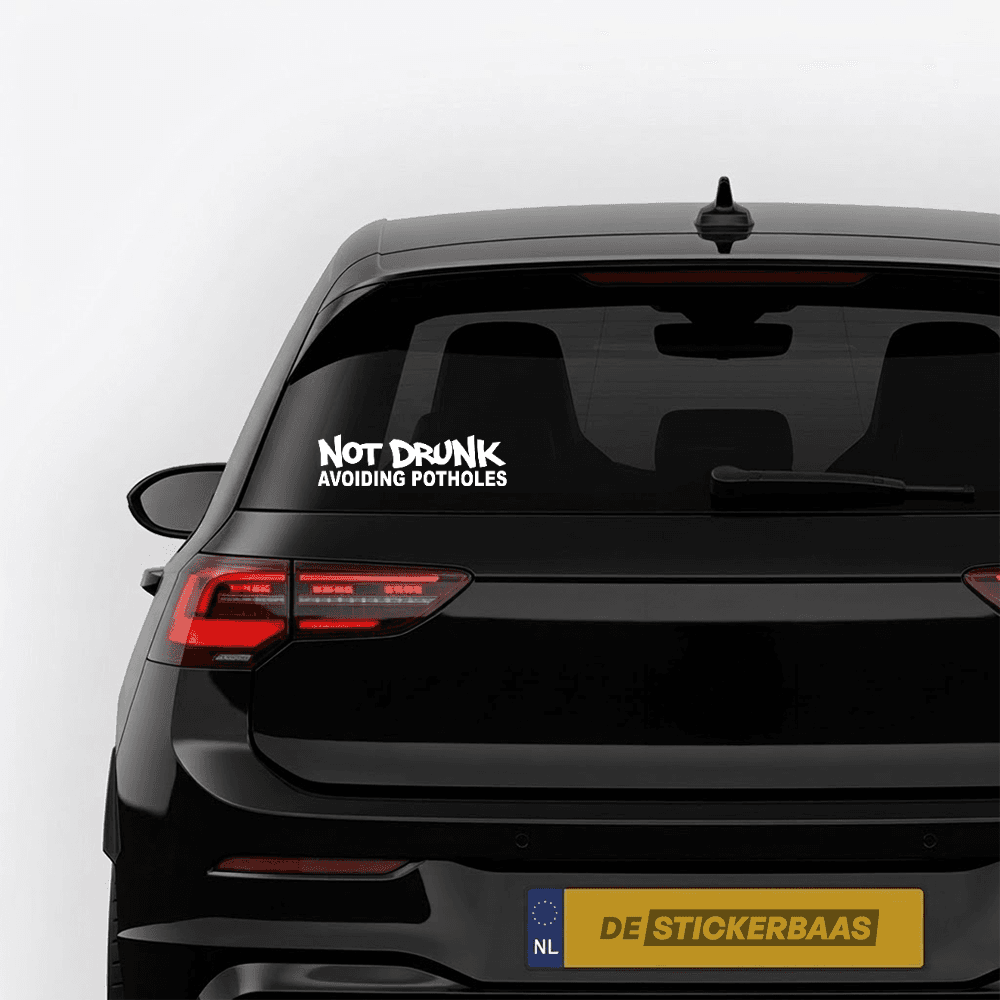 Not drunk, avoiding potholes - vinyl sticker kopen bij De Stickerbaas
